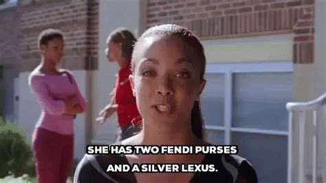 two fendi purses and a silver lexus|She has two Fendi purses and a silver Lexus..